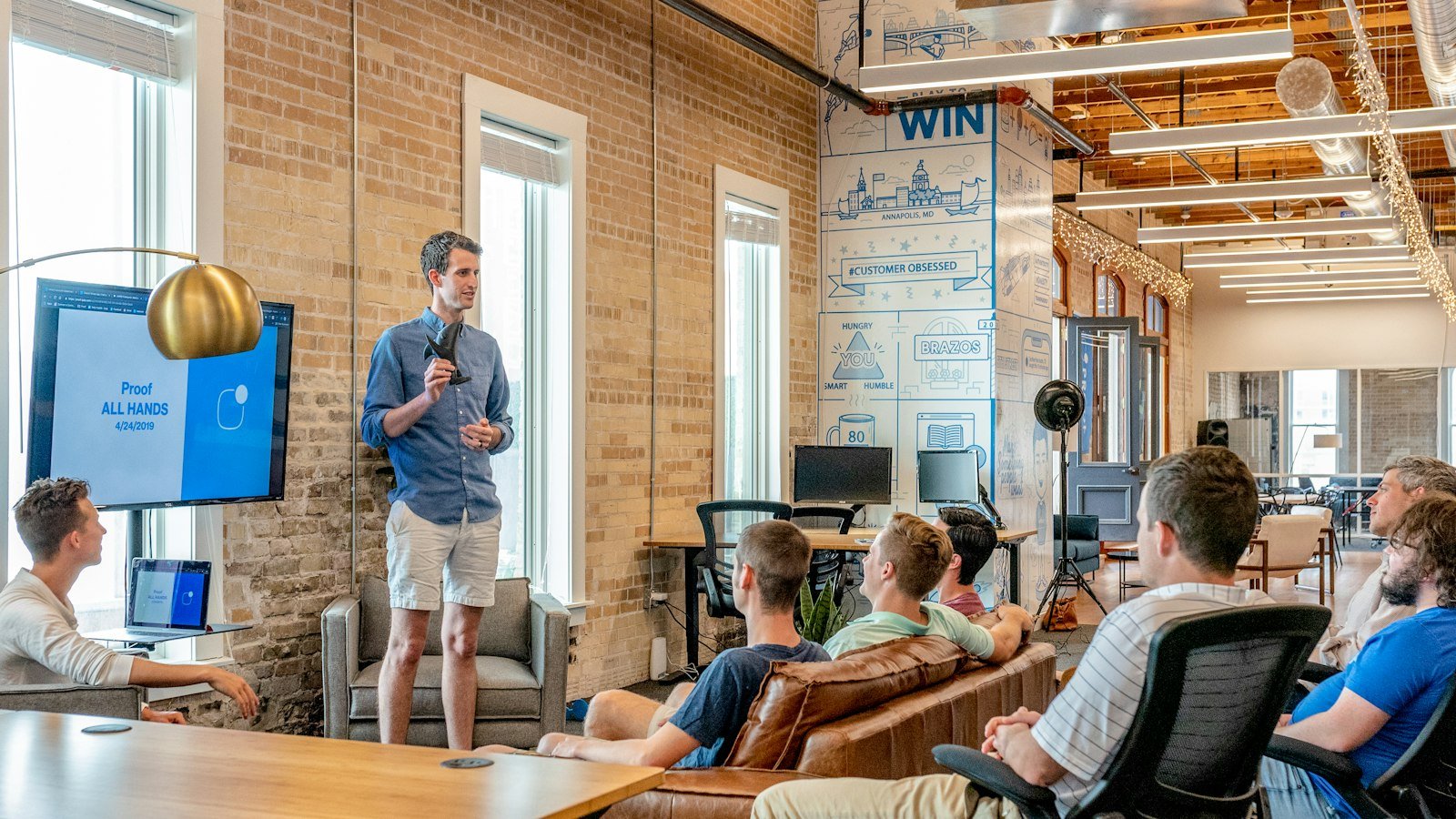 Assertive Insurance advisors collaborating in modern corporate office