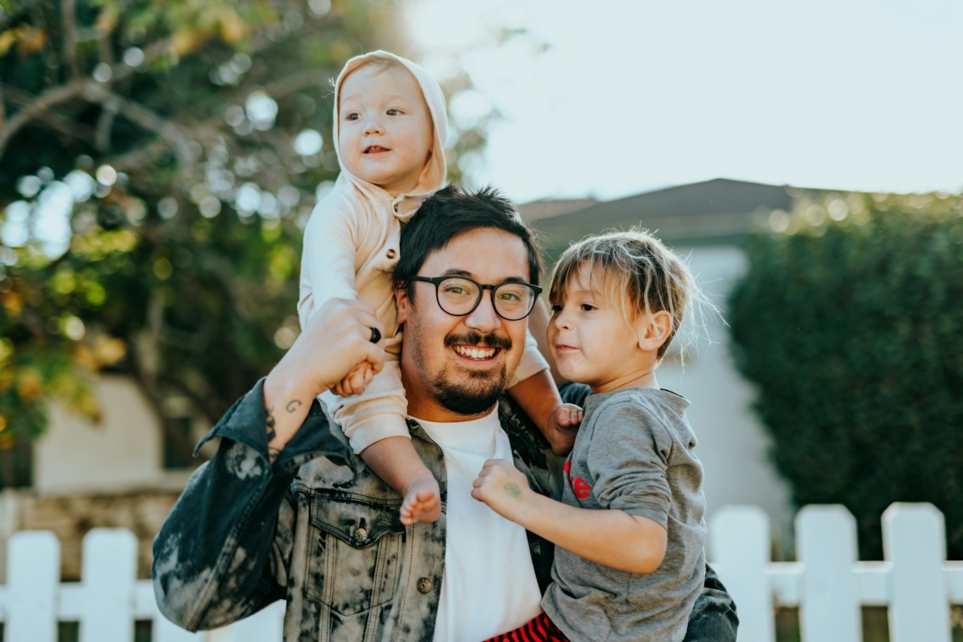 Happy American family together at home protected by Assertive Insurance